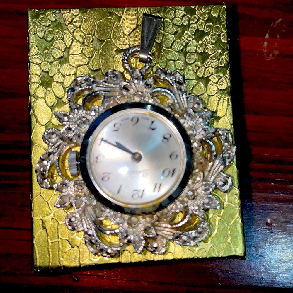 Vintage Swiss made watch pendant sign Desire.